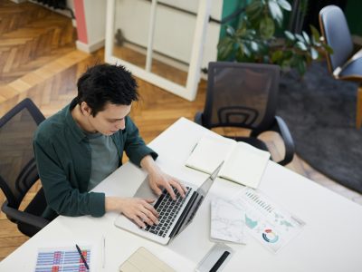 Businessman uisng laptop in work